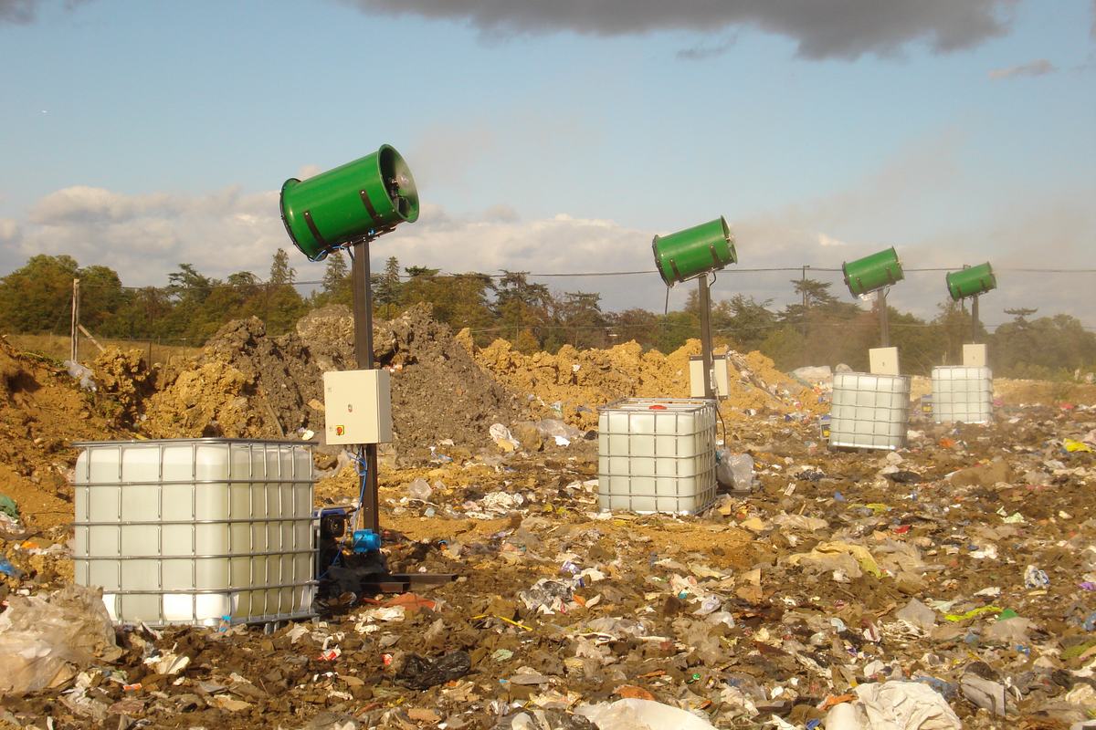 Multiple stand-alone odour control units deployed across an active landfill site with IBC solution tanks